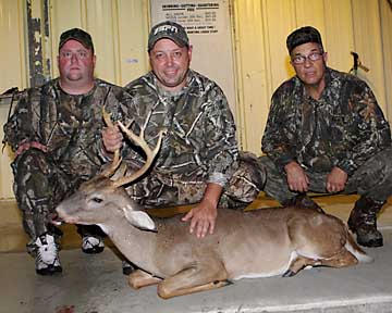 Robert, Carl and Ron with a Boggy Creek buck