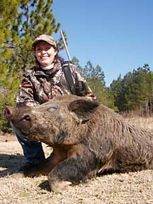 Michelle with her first hog ever