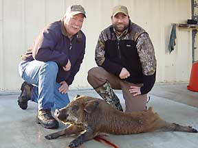Robert and his son Chris with his Bowers tract boar