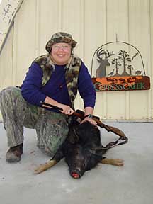 Patrice with her first hog!