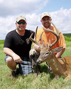 Sgt. Stube and Terry with a Boggy Creek buck that scored 126 2/8 B&C