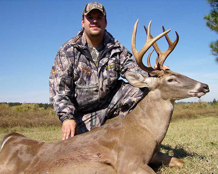 Ryan with his heavy 8pt buck