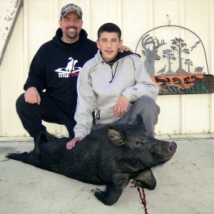 John and Johnnie with their boar