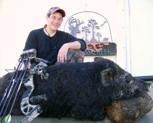 Steven with his bow-kill boar