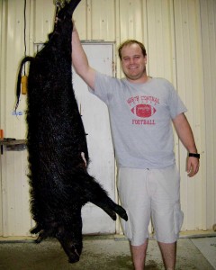 Ryan with his first hog