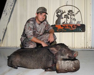 Kyle with his 148lb river boar
