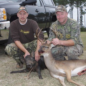 Chad with his hog and John with his good 8pt