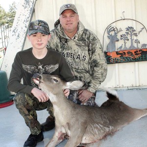 Garrett with his first deer and Uncle Tom