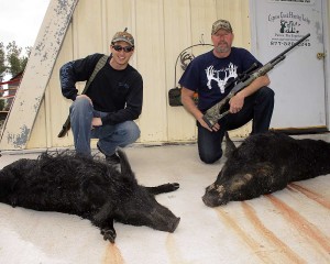 Rudy with his giant sow and Jerry with his big boar